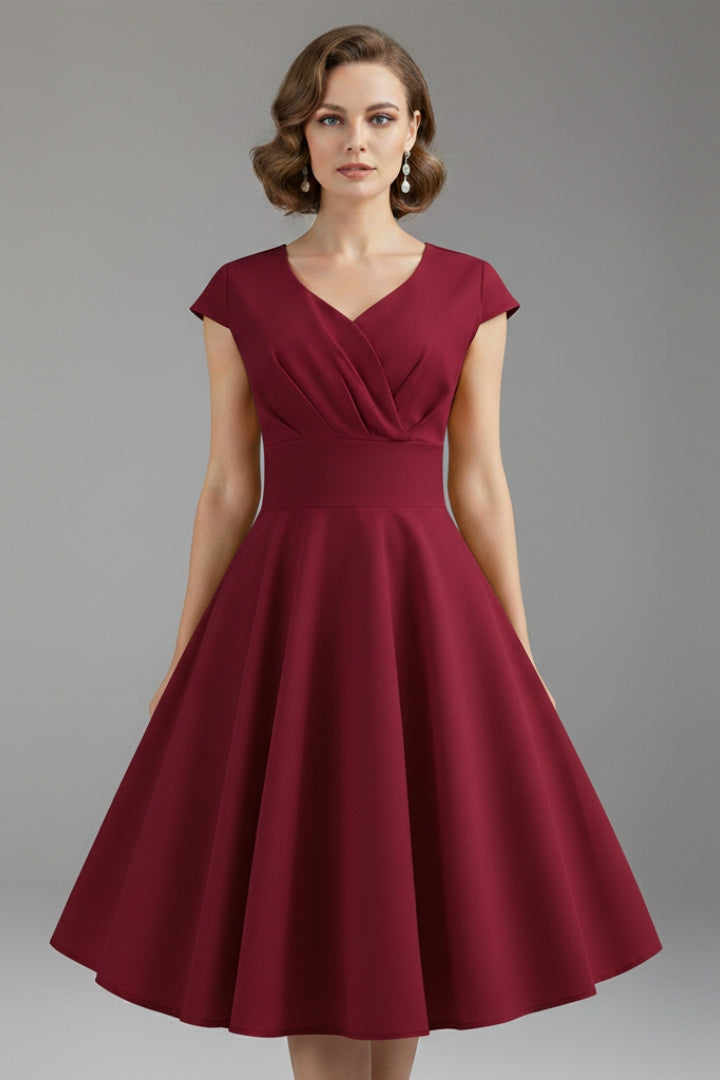 Women's Dress with Waist Cut and Flowing Hem